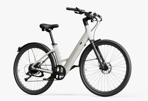 Side view of the Urtopia Carbon Classic Step Thru eBike in creme color, showcasing its lightweight carbon frame, step-through design, and sleek modern styling against a plain background.