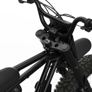 Side view of the Super73 Z Adventure Series SE electric bike in a rugged outdoor setting, showcasing its thick tires, sturdy frame, and adventure-ready design.