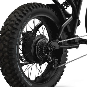 Side view of the Super73 R Adventure Series SE eMOTO eBike in a showroom, highlighting its rugged frame, thick tires, and sporty design.