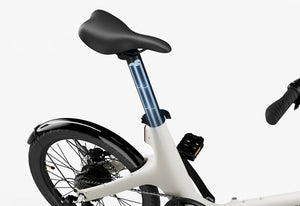 Urtopia Carbon Fold Step Thru eBike in creme color, side view, folded for compact storage
