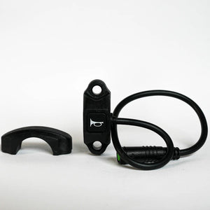 Close-up of a black eBike horn switch designed for Super73, featuring a compact rectangular button with wiring attached.