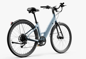 Side view of the Urtopia Carbon Classic Step Thru eBike in Glacier Blue, showcasing its lightweight carbon frame, step-through design, and sleek modern styling.