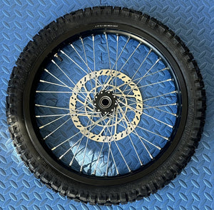Surron eMoto wheel set with Shinko 244 dual sport 17-inch front and rear wheels and tires for moto bikes, shown without rotor or sprocket.