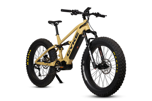 Desert yellow eBike Cyke Falcon X electric bicycle side view against a neutral background
