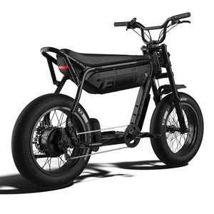 Side view of the Super73 B1G SE eMOTO eBike in a showroom, showcasing its black frame, thick tires, and retro-inspired design.
