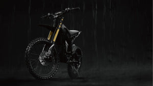 Black eMOTO Tork Pro Sport electric bike, side view, showcasing sleek design and sporty frame