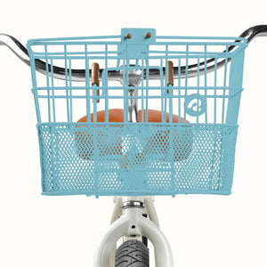Retrospec Apollo steel bike basket in cool mint color attached to an eBike