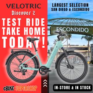 Mint green Velotric Discover 2 eBike in original box, product image on white background.