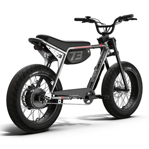 Side view of the eMOTO eBike Super73 ZX Core in a showroom, highlighting its sturdy frame, thick tires, and minimalist design.
