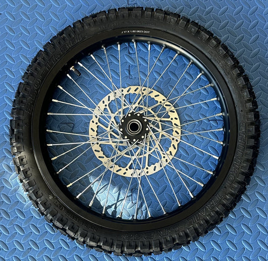 eMoto Shinko 244 Dual Sport 17" front wheel and tire set for eMoto bikes, offering excellent grip and performance on off-road trails and on-road surfaces, designed for durability and smooth handling in all conditions.