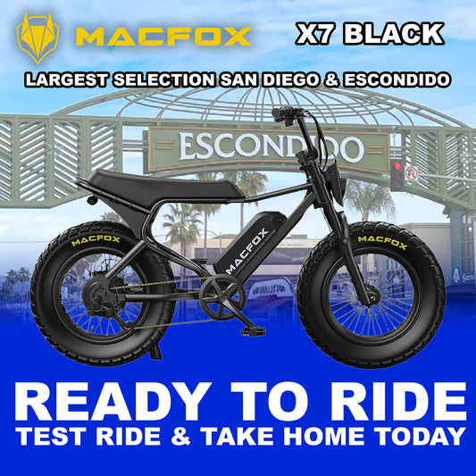 Black Macfox X7 eBike side view, showcasing rugged frame, thick tires, and modern design against a plain background.