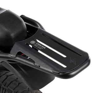 Side view of a Super73 R-Series electric bike equipped with a black rear rack mounted above the back wheel.