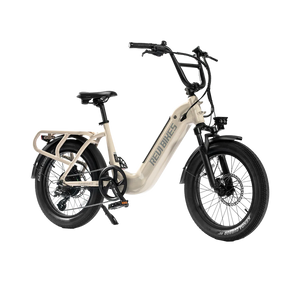 Cream-colored eBike Revi Runabout.2 electric bicycle, side view, displayed on a white background.