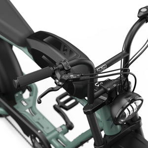 Side view of the Super73 S2 Laguna electric bike in a coastal setting, highlighting its sleek frame, wide tires, and modern design features.