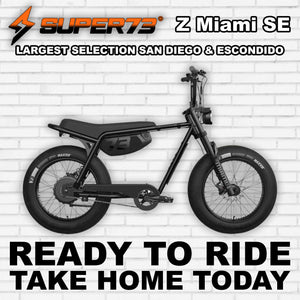 Super73 Z Miami SE electric bike in R2R Blackout color, side view, black frame with minimalist design, thick tires, and compact build.