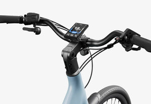 Side view of the Urtopia Carbon Classic Step Thru eBike in black, showcasing its lightweight carbon frame, step-through design, and integrated display on the handlebars.