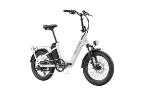 Pearl White Velotric Fold 1 eBike, folded, side view, showcasing compact design and sleek frame.