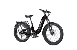 Side view of the Velotric Nomad 2X Step-Thru eBike in a studio setting, showcasing its frame design, battery placement, and wide tires.