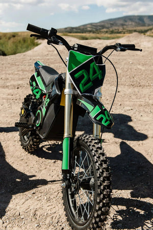 A black eMOTO eBike Drift Hero 1600w dirt bike shown from a side angle, highlighting its rugged tires, sturdy frame, and electric motor components, set against a plain background.