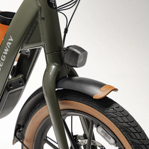 Electric bike Segway Muxi, side view, black frame, thick tires, modern urban design, photographed on a white background.