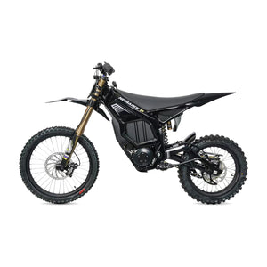 A folded blue Nomadix towel with Juiced Powersports branding displayed on a white background.