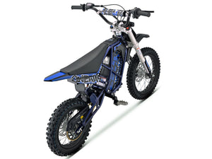 Side view of the eMOTO Stomp Ebox V3 72 RS electric dirt bike, showcasing its frame, wheels, and suspension system.