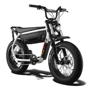 Side view of the eMOTO eBike Super73 M1D SE in a showroom, showcasing its frame, tires, and design features.