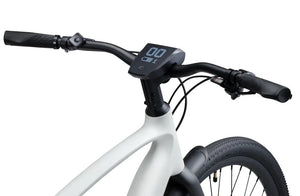 Side view of the Urtopia Carbon 1 Pro eBike in a sleek black finish, showcasing its lightweight carbon fiber frame, integrated display, and minimalist design against a plain background.