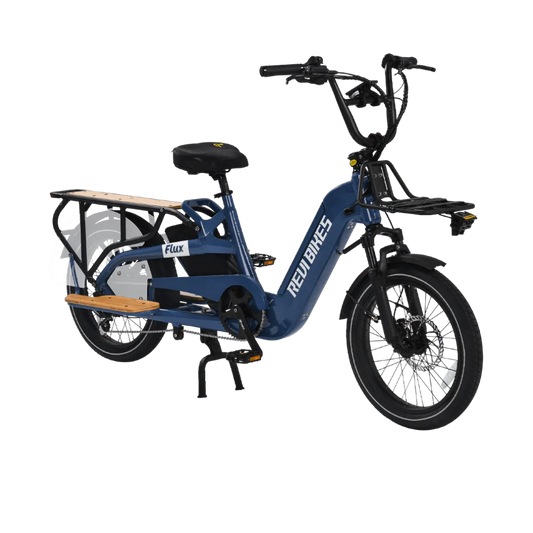 A REVI Flux 750w Step Thru eBike with 20x2.4 inch fat tires, shown as a compact electric cargo bike in a product image.