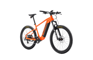 A black Velotric Summit 1 eBike with front suspension, thick all-terrain tires, and a sturdy frame, displayed on a white background.