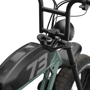 Side view of the Super73 S2 Laguna electric bike in a coastal setting, highlighting its sleek frame, wide tires, and modern design.