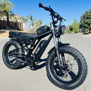Green eMOTO FREEGO Shotgun Lite F0 electric mini fat tire e-bike with 500W motor, e-moto style, side view against a white background