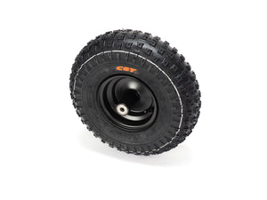 Front view of a Stomp Ebox Dragster front wheel with mounted tire, showing tread pattern and black alloy rim.