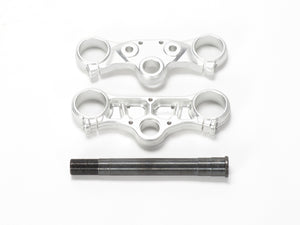 Stomp Ebox triple clamps with steerer, front view showing black anodized finish and precision-machined aluminum construction.