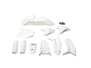 White plastic kit components for Stomp Ebox, including fenders, side panels, and number plate, displayed on a plain background.
