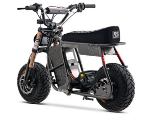 Side view of the eMOTO Stomp Ebox Dragster RS electric dirt bike, showcasing its rugged tires, black and red frame, and sporty design against a plain background.