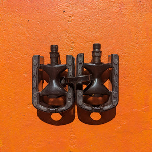 Metal bicycle pedal, style 6, featuring a durable, textured surface and sleek design, photographed on a plain background.