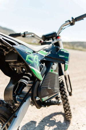 A black eMOTO eBike Drift Hero 2500w dirt bike with rugged tires, sturdy frame, and front suspension, displayed on a white background.