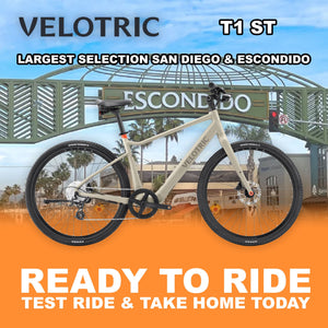 Velotric T1 ST eBike in sand color, side view, ready to ride, against a plain background