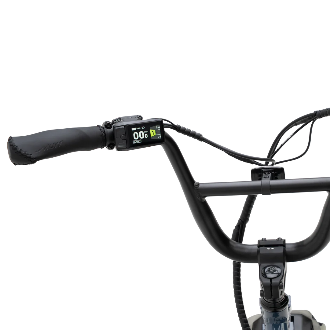 Side view of the Murf Higgs Plus eBike in a neutral setting, showcasing its sturdy frame, wide tires, and integrated battery.