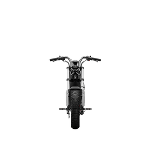 Side view of the eMOTO Segway Xyber electric bike parked outdoors, showcasing its rugged tires, sturdy frame, and modern design features.