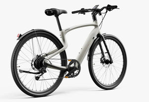 Sleek black Urtopia Carbon Classic eBike with lightweight carbon fiber frame, integrated display, and minimalist design, shown from a side angle against a white background.