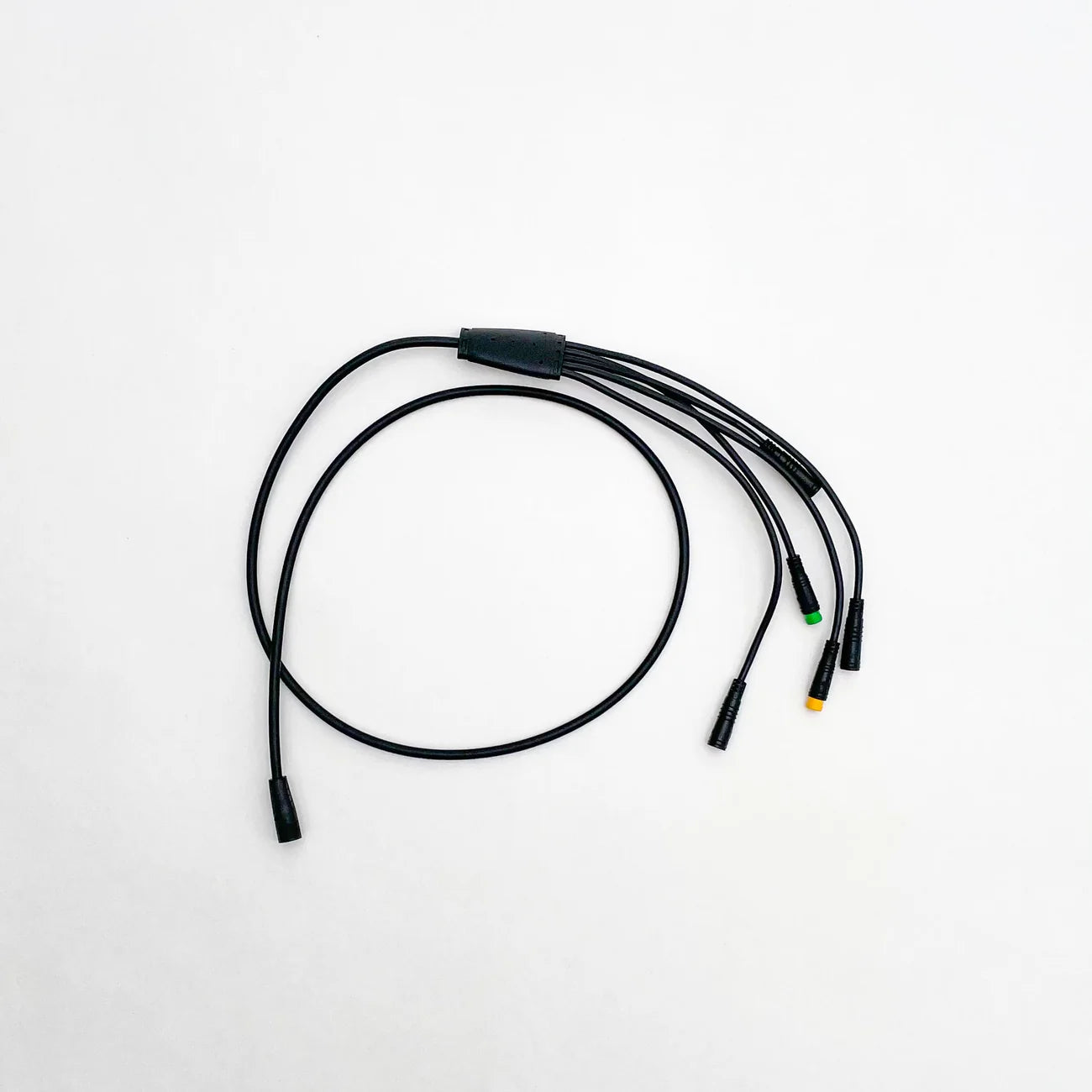 Close-up view of the Super73 R/RX/S2 eBike wiring harness showing multiple colored wires and connectors arranged for installation.