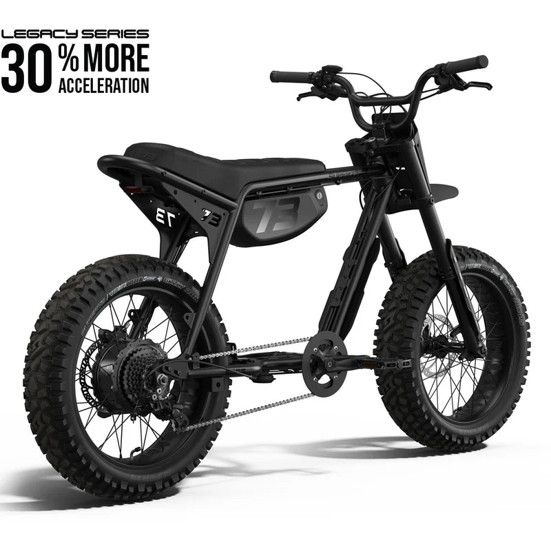Side view of the Super73 Z Adventure Series SE electric bike in a rugged outdoor setting, showcasing its thick tires, sturdy frame, and adventure-ready design.