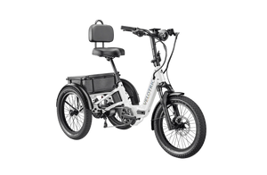 Side view of a Velotric Triker electric trike in matte gray, showing three wheels, a step-through frame, rear cargo basket, and ergonomic handlebars.