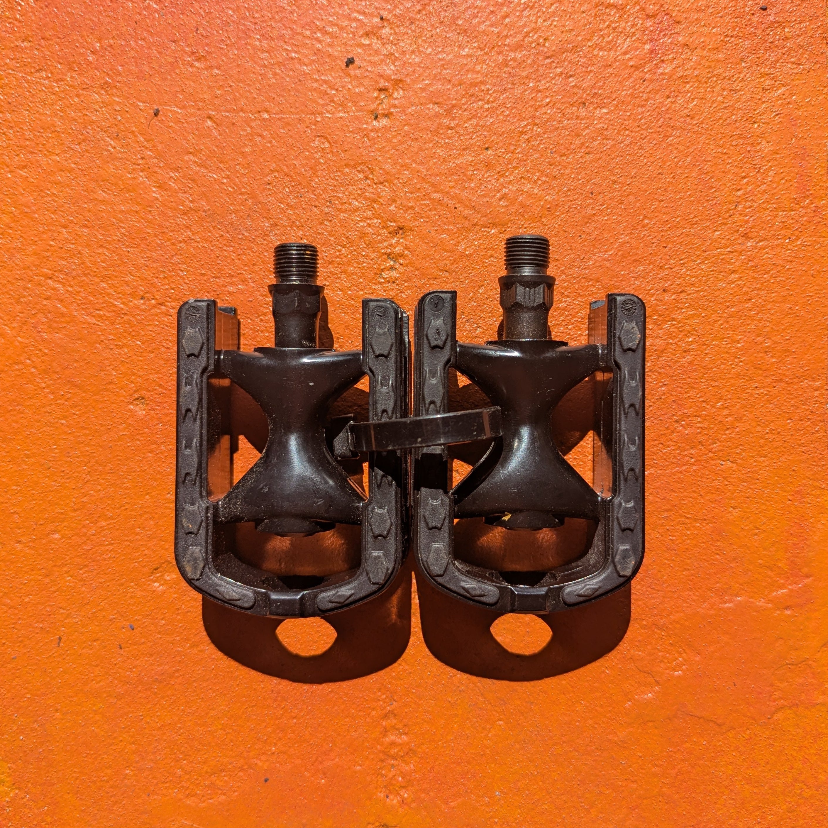 Metal eBike pedals, Style 6, featuring a textured surface and sturdy construction, shown in a close-up product image.