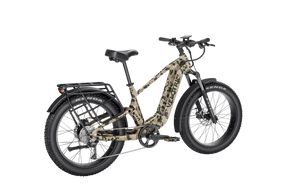 Side view of the Velotric Nomad 2X eBike in matte black, showcasing its sturdy frame, thick all-terrain tires, and integrated battery.