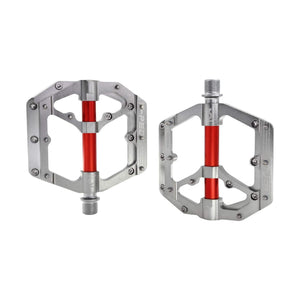 Silver and red alloy eBike pedals, product image showing pair in silver with red accents