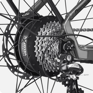 Side view of the Velotric Discover 2 eBike in white, showcasing its step-through frame, rear rack, and integrated battery.