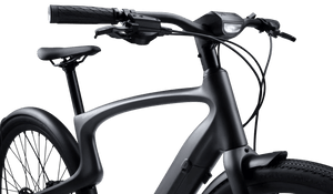 Urtopia Carbon1 Pro eBike in matte black, shown in its box with packaging, product image.